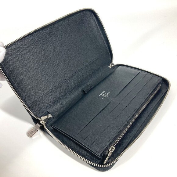 LOUIS VUITTON Black Leather Wallet - Picture 9 of 16